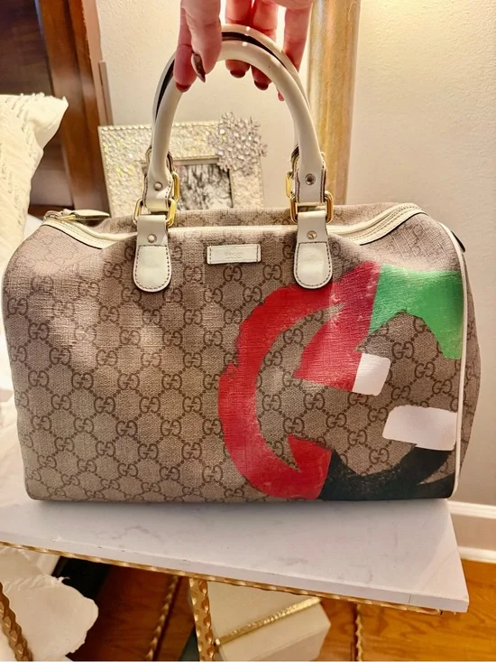 GUCCI Guccisima, hint of sparkle GG Supreme painted beige canvas Boston Bag