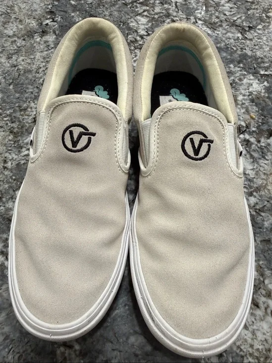 Vans  Slip-On Sneakers in Light  with Black Logo