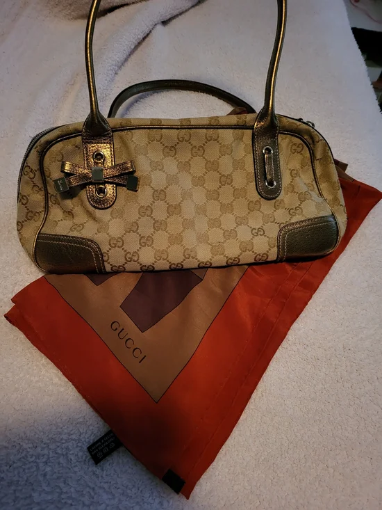 Gucci Beige Monogram Shoulder Bag with Metallic Brown Trim and Bow