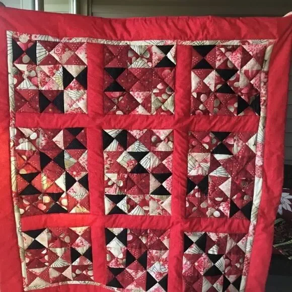 NWT Hand Crafted Red, Black, Gold and Tan Prints Quilt with Red Borders