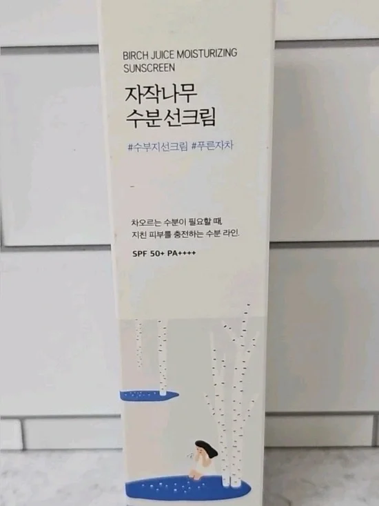 SPF 50+ - White with Blue Accents