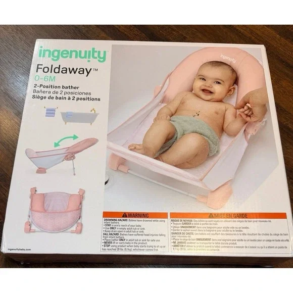 New in box foldaway 2 position bather. Pink.  For 0-6 months.