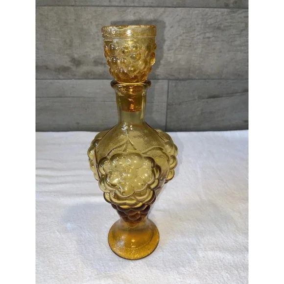 Vintage Amber Glass Decanter with matching stopper in grape pattern
