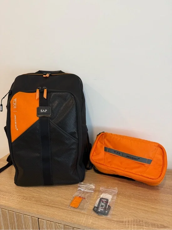 Tumi Black and Orange Men's Backpack with Detachable Travel Pouch