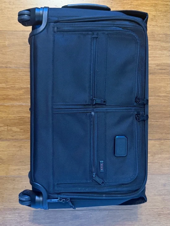 Tumi Black Garment Spinnerwith Front Organization Pockets