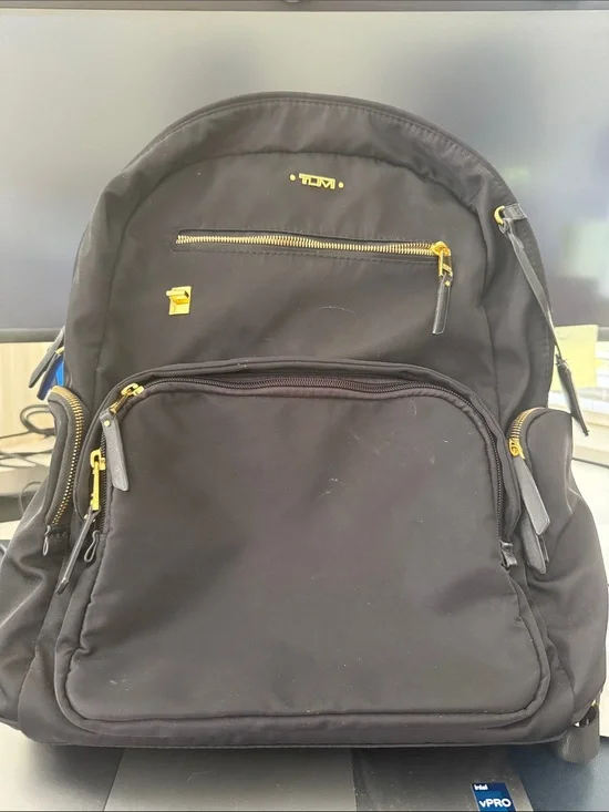 Tumi Black Backpack with Gold Hardware