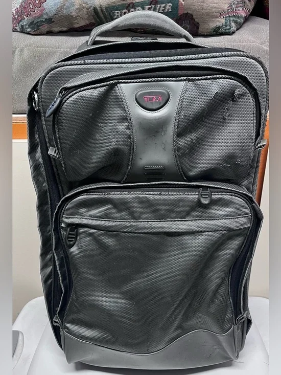 Tumi Grey Suitcase 22x9x14”