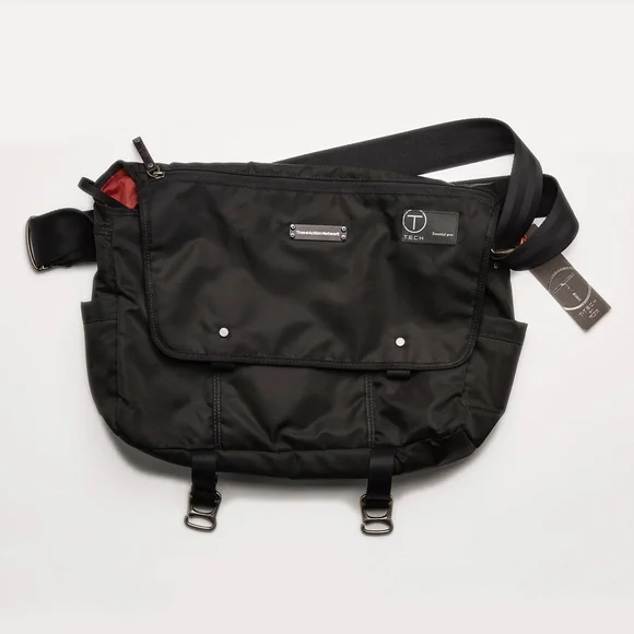 Tumi Black Messenger Bag with Red Accent