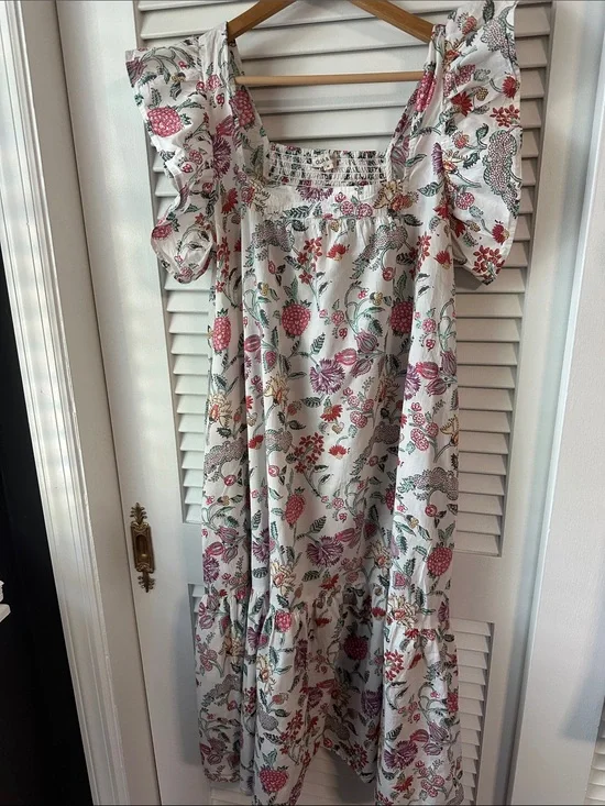 Beautiful Floral White Cotton Maxi Dress with Ruffle Sleeves and hem.