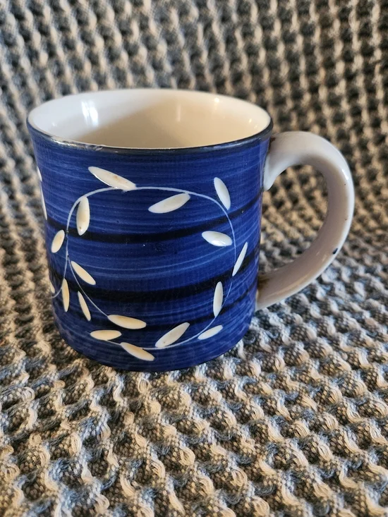 Blue Ceramic Coffee Mug with White Leaf Accent