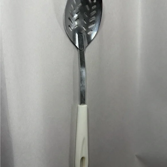 Elegant Slotted Spoon with Cream Handle