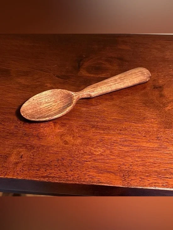 Hand carved small wooden spoon