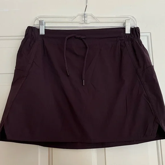 Women’s Te Verde dark purple active tennis pickleball skirt with pockets.Medium