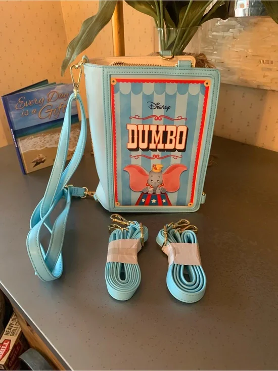 DISNEY, NEW NEVER CARRIED, Dumbo Storybook convertible crossbody or backpack.