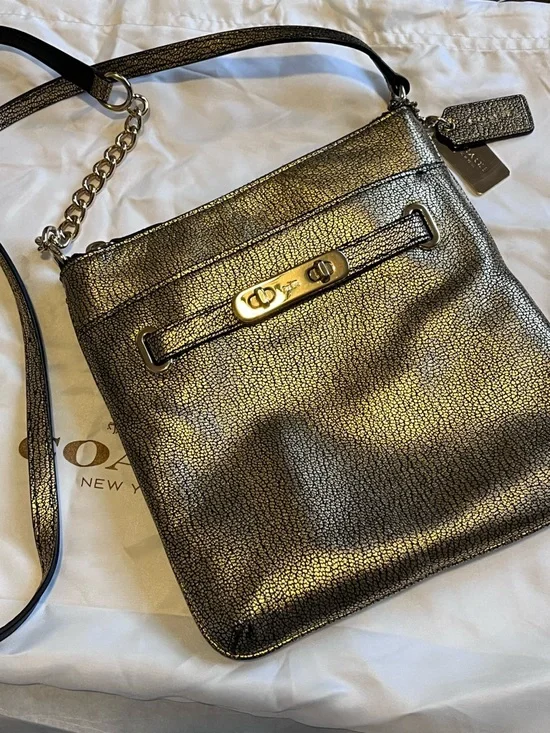 Coach Swagger Swingpack Metallic Gold Crossbody Bag with Turnlock Detail and bag