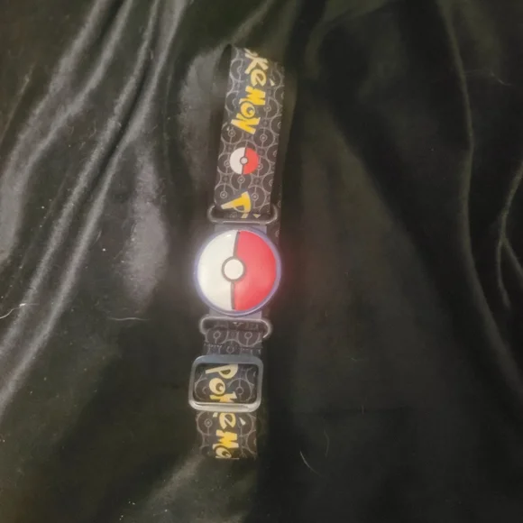 Red and Black Watch with Intricate Bead Design