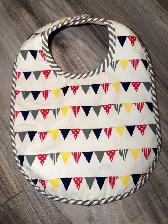 Baby Birthday Bib with Navy, Yellow, Red & Gray Bunting Pattern