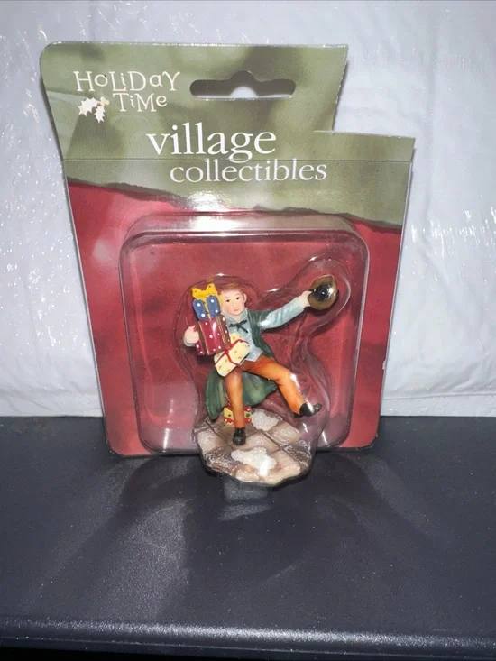 Holiday Time Figurine - Green Coat, Orange Pants, Red and Blue Gifts