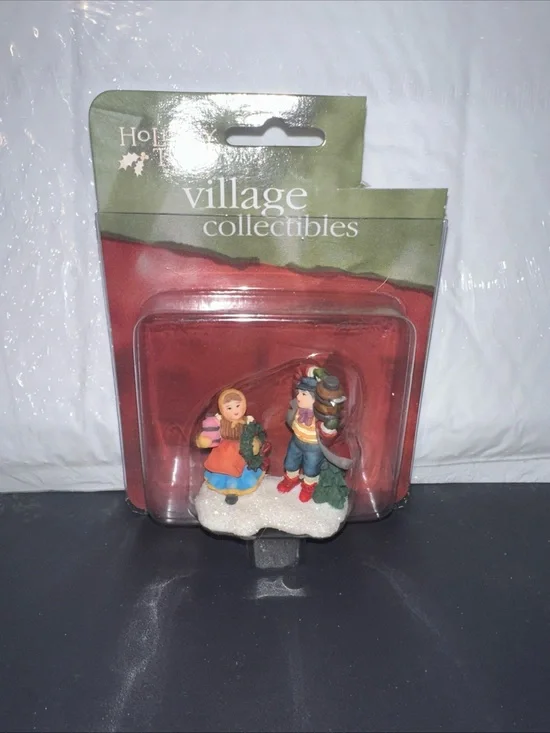Village Collectibles Holiday Figurine Set in Red, Green, Blue