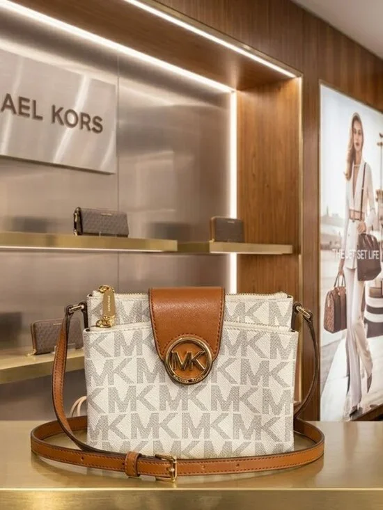 Michael Kors vanilla/brown leather Signature Fulton Monogram crossbody bag