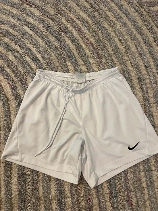 Nike White Performance Shorts with Black Swoosh