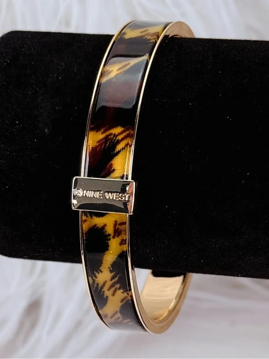 Beautiful, goldtone, animal print nine west bangle bracelet