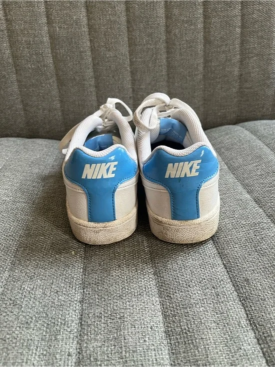 Nike Women’s White Sneakers with Light Blue Heel Tab