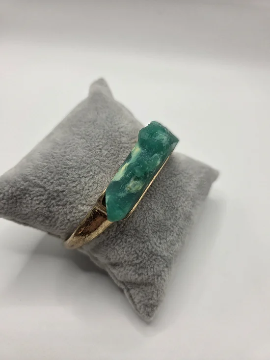 1528. Gold Tone Cuff Bracelet With Green Raw Stone