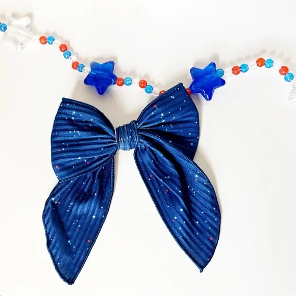 Speckled Fourth of July Cam Bow