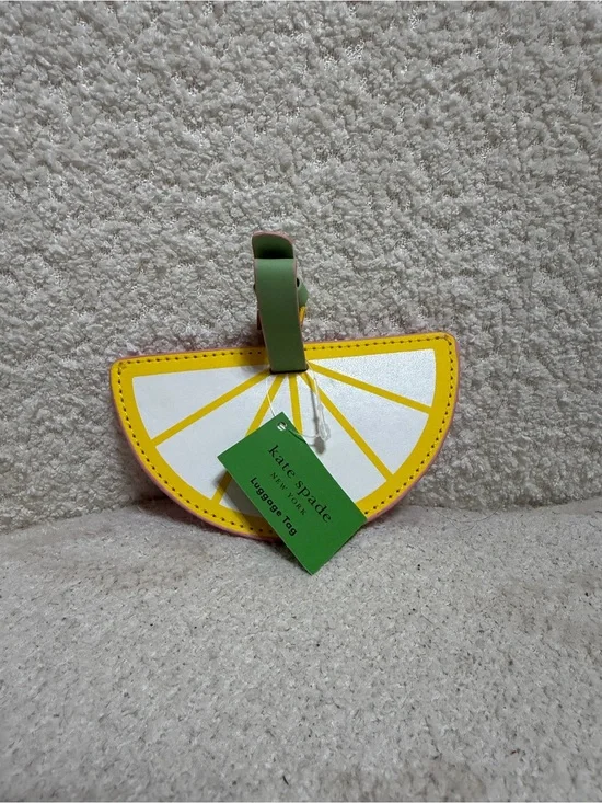 kate spade Yellow and White Lemon Slice Luggage Tag with Green Strap