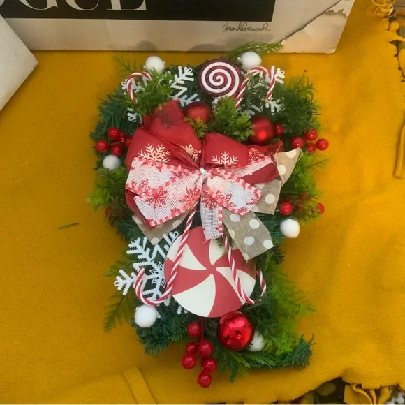 Holiday artificial Christmas teardrop swag for inside or outside decoration