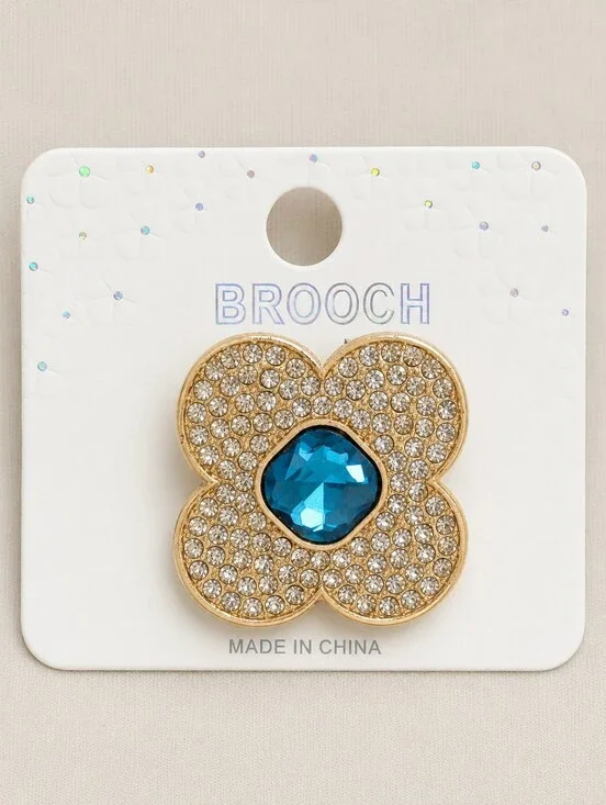 Gold Tone Rhinestone Flower Brooch Pin with Iridescent Crystal Center Blue