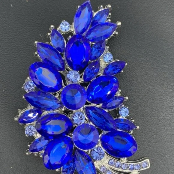 Silver tone and Large blue rhinestone brooch