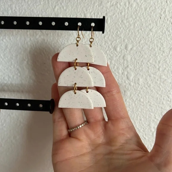 White speckled clay half-circle dangly earrings