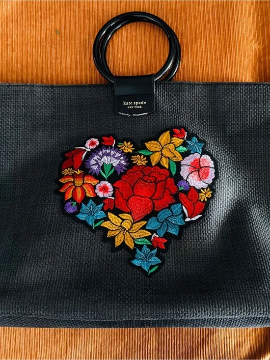 Kate Spade black tote with colorful embroidered floral heart