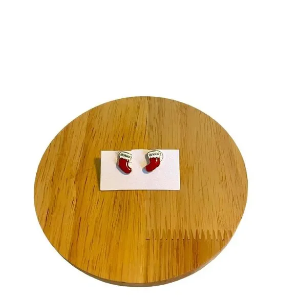 FREE Christmas earring with $35 purchase‎