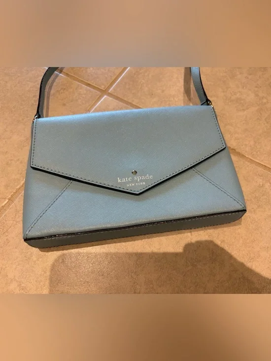 Kate Spade NY Cedar Street Monday envelope style leather crossbody bag blue