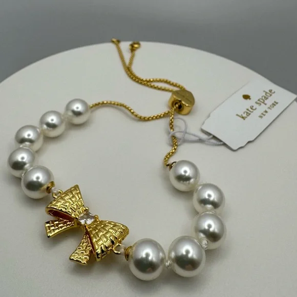 KATE SPADE Wrapped In A Bow Slider Bracelet NWT with Dust Bag