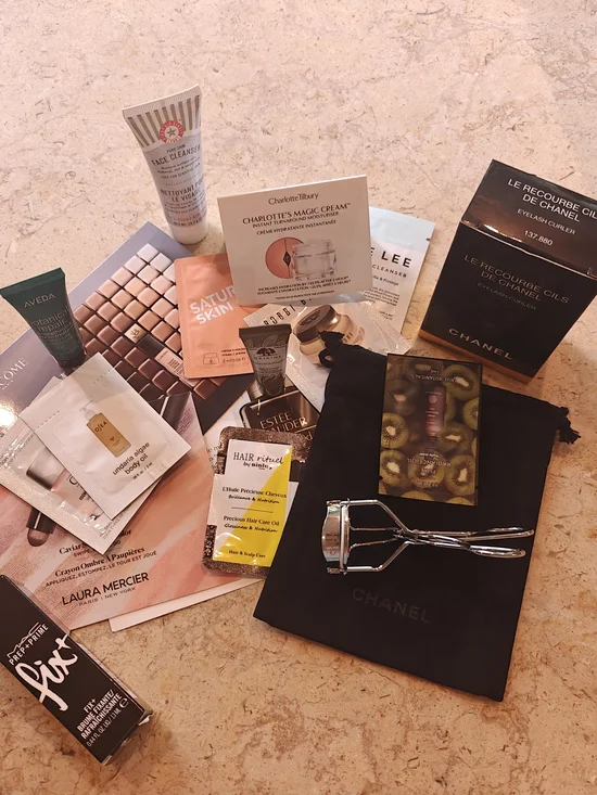 CHANEL Eyelash Curler with Black Pouch And Asst Beauty Samples