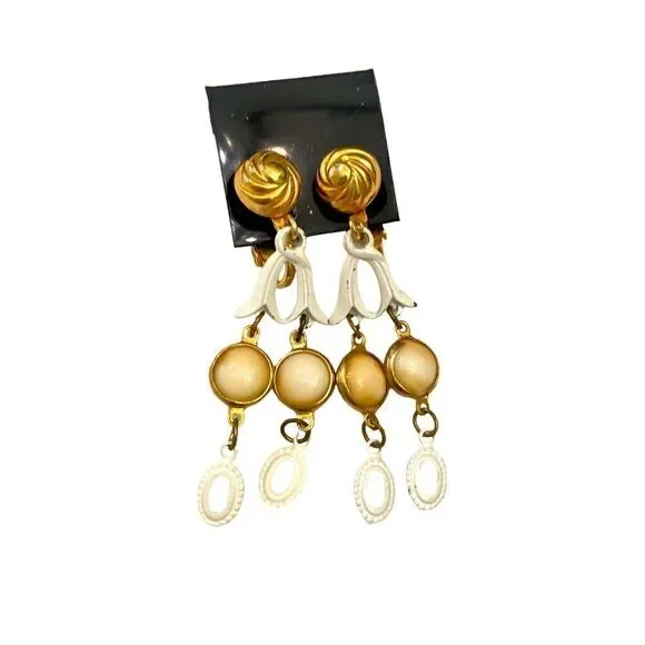 New Vintage 1990’s soft clip on drop earrings gold tone swirl & white enamel