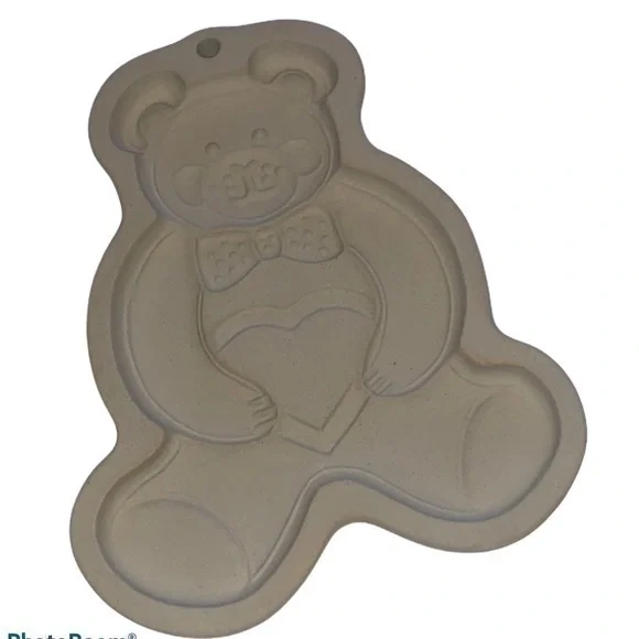 The Pampered Chef clay cookie mold
