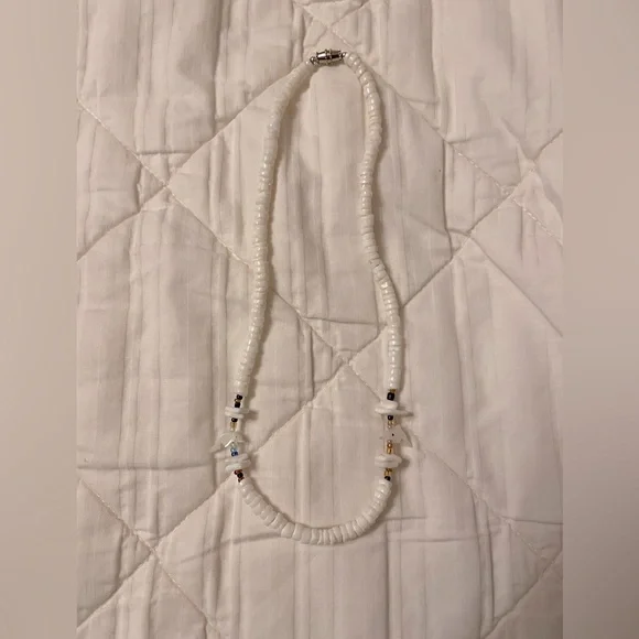 Dolphin Puka Shell Necklace