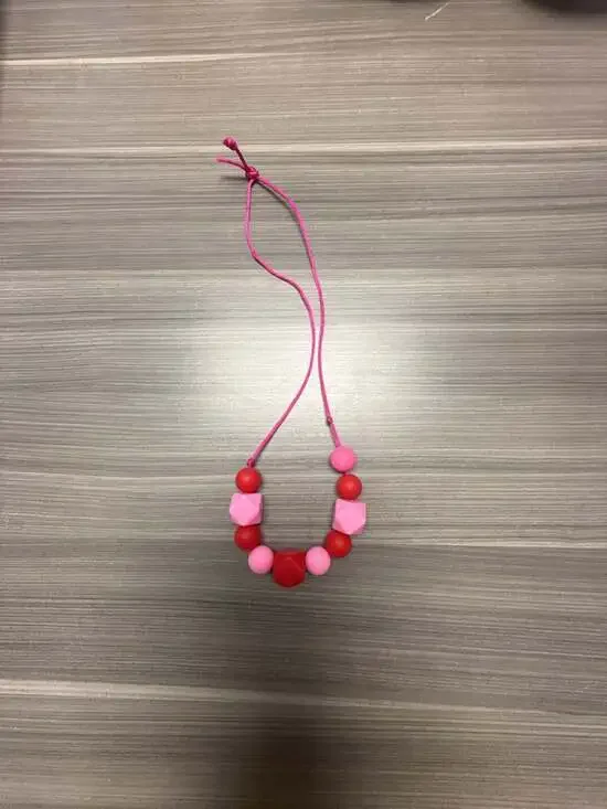 Silicone Teething Sensory Chew Necklace in Pink and Red