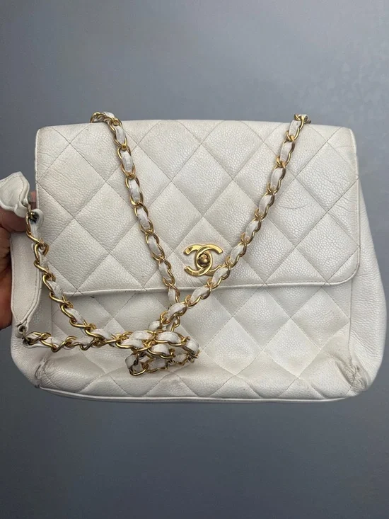 CHANEL Quilted Leather Shoulder Bag in Cream with Gold Chain