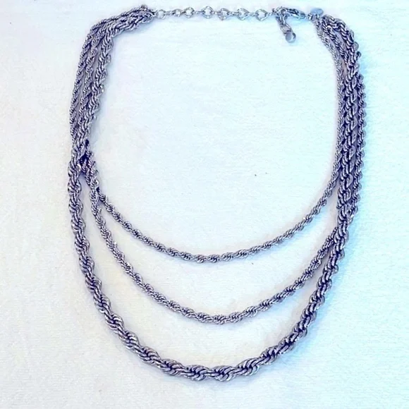 Chicos triple strand graduated size silver tone braided twisted chain