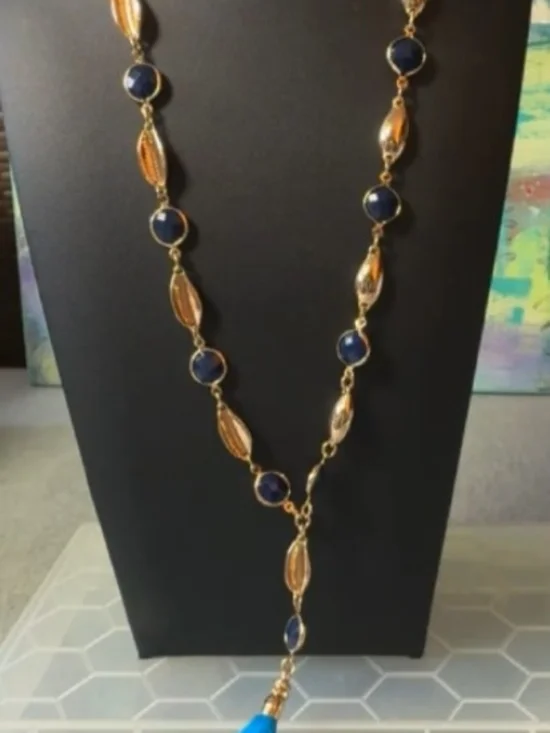 Lilly Pulitzer necklace features a vibrant blue tassel & gold-tone chain - NWT