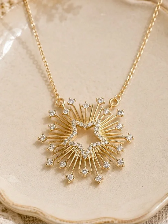 Gold Starburst Necklace with Crystal Accents
