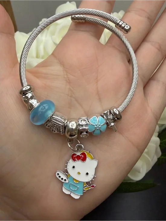 Silver Cable Charm Bangle with Blue Flower Beads and Hello Kitty Charm