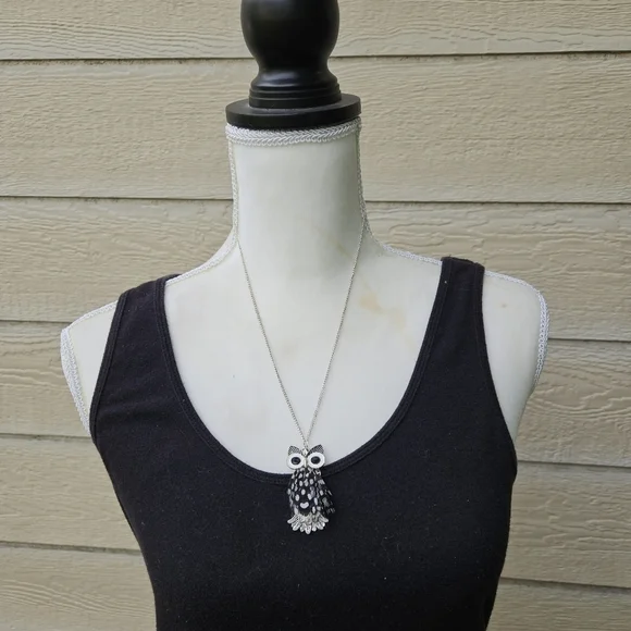 silver tone chain necklace with feathery owl pendant