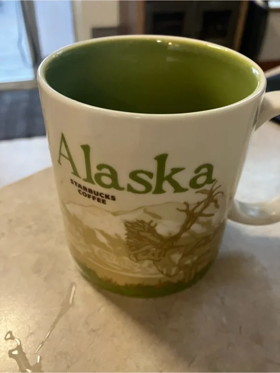 Starbucks White Mug with Green Interior and Green Alaska Lettering